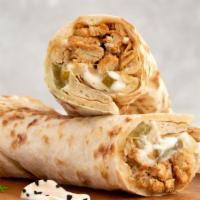 Chicken Shawarma Wrap · white meat chicken shawarma wrapped with tomatoes,pickles,cabbage and garlic sauce.