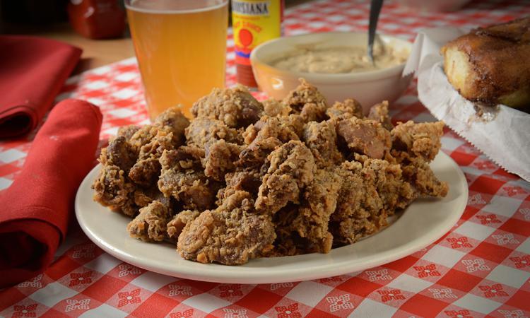 Gizzards · Pan Fried Gizzards served with our homemade gravy.