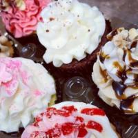 6 Pack Classic Cupcakes · Your choice of our classic flavors: chocolate, vanilla, marble, confetti and red velvet.

(p...