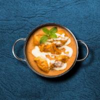 Butter Chicken Delight  · Chunks of grilled chicken cooked in a smooth buttery & creamy tomato-based gravy. Served wit...