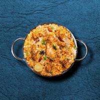 United Chicken Biryani · Long-grained rice dish layered with spicy marinated chicken, caramelized onions and fresh he...