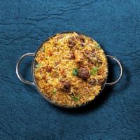 United Goat Biryani · Long-grained rice dish layered with tender morsels of bone-in goat meat, caramelized onions ...