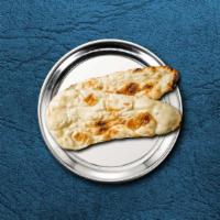 Naan Bread · A leavened, clay oven-baked flatbread.