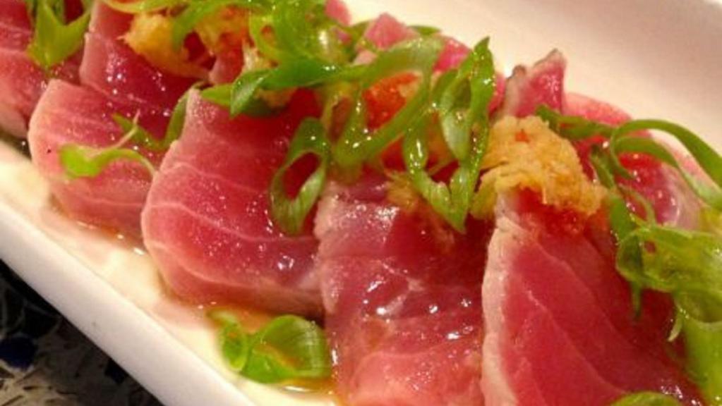 Tuna Tataki · Pan seared sliced tuna served with ponzu sauce.