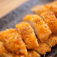 Ton Katsu · Pork. Tender meats dipped in a light bread crumb batter and then deep fried. Served with mis...