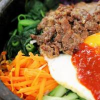 Beef Bibimbap · Rice with assorted vegetable and beef, and marinated in sesame oil. Served with miso soup an...