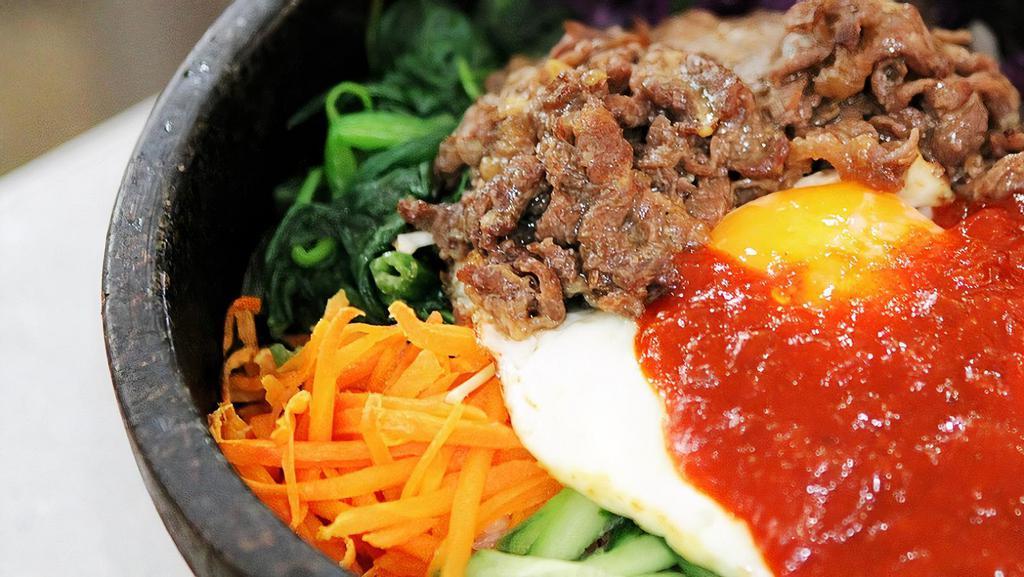 Beef Bibimbap · Rice with assorted vegetable and beef, and marinated in sesame oil. Served with miso soup and white rice.