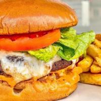 Nirvana Burger · Handcrafted veggie patty, lettuce, tomato, onion, mozzarella, spicy mayo spread . W/ fries o...