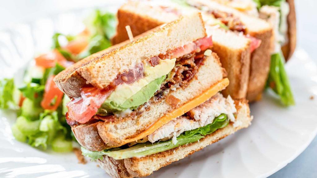 Turkey Club · Bacon, lettuce, tomato, mayonnaise and white toast. Includes Chips