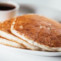 Buttermilk Pancakes · Pure maple syrup, whipped sweet cream butter.