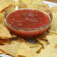 Salsa And Chips · House made chunky salsa with chips