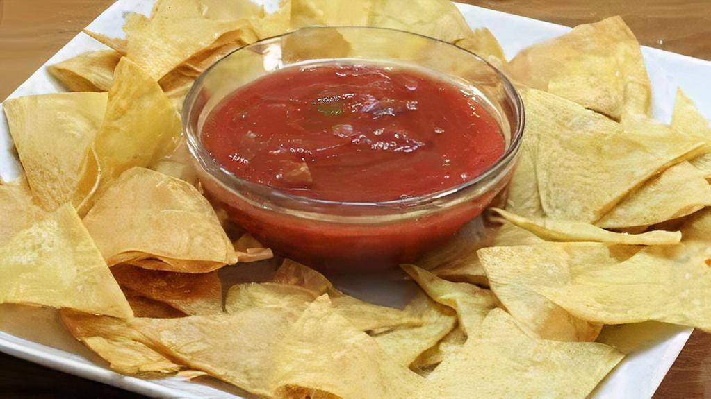 Salsa And Chips · House made chunky salsa with chips