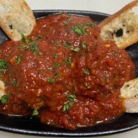 Brooklyn Balls · House made Italian meatballs (3) smothered in plum Pomodoro sauce with two slices of garlic ...