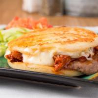 Gorditas · Thick corn tortilla stuffed with your choice of meat, beans, and melted asadero cheese, a si...