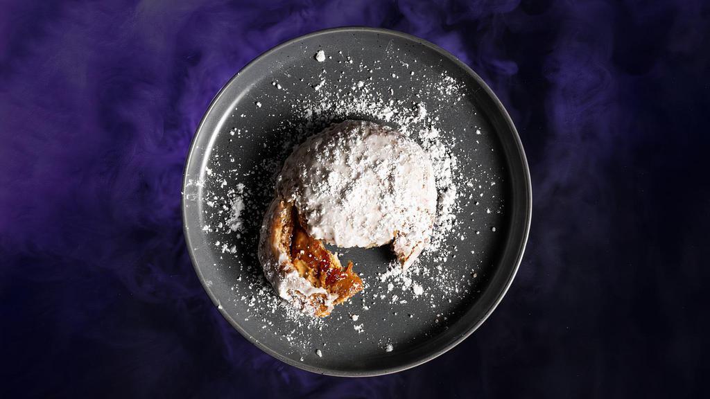 That Sticky Pb&J · Irresistible ooey gooey fried Peanut Butter & Grape Jelly dusted with powdered sugar.