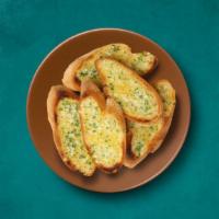 Garlic Bread · House-made signature garlic bread, served with Romano lightly dipped in olive oil and marina...