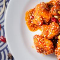 Sesame Chicken · Spicy. Lightly Breaded Tender Chicken Chuck, Heat Tossed In Tso's Sauce with Sesame Seeds