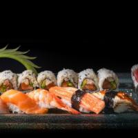 Sushi Combo D · 6 Pieces Sushi: Tuna, Salmon, White Fish, Crab, Shrimp and Eel. Also Include Tuna Roll and P...