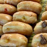 Filled Donut · Filled donuts with your option
 strawberry, lemon, apple, chocolate, vanilla, or bavarian.