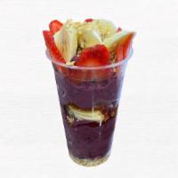 Traditional · Açaí pure, banana, mix berries and almond milk. Topped with strawberries, banana, granola an...