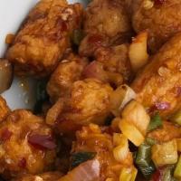 Crispy Baby Corn · Baby corn cut into cubes crispy fried, onion, green and red bell peppers, garnished with red...