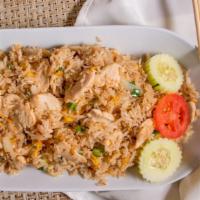 Thai Fried Rice · Stir-fried jasmine rice with eggs, white onions and chopped green onion.
