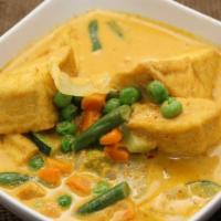 Yellow Curry · Coconut milk with potatoes, white onions, carrots and bell peppers.