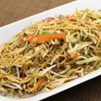 Hakka Noodles · Wheat noodles with carrots, cabbage, bell pepper, celery, onions, spring onions and flavored...