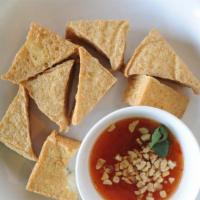 Fried Tofu · Eight pcs fried tofu and served with ground peanuts in sweet chilies sauce.