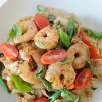 Pad   Kee   Mao · Wide rice noodles stir fried with egg, basil, green beans, onions, and sweet peppers in garl...