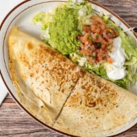 Super Quesadilla · Large quesadilla stuffed with your choice of meat. Rice and beans on the inside