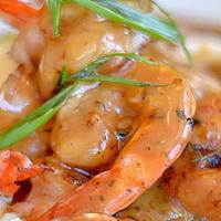 Shrimp Alfredo · Fettuccine with perfectly plump shrimp in a rich, flavorful alfredo sauce with a velvety tex...