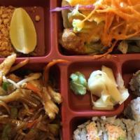 *Bento Box · Shrimp and vegetable tempura, sashimi, nigiri, and a California roll.