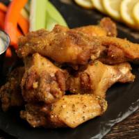 Lemon Pepper · 8 lemon pepper wings, served with carrots & celery and a choice of blue cheese or ranch for ...