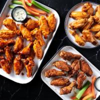 The Bracket Buster · A 32 count order of wings in two different flavors, with 4 Fries and 4 Drinks. Comes with Ra...