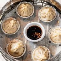 Xia Long Bao / Soup Dumplings · Traditional pork-filled soup dumplings. 6 dumplings.
