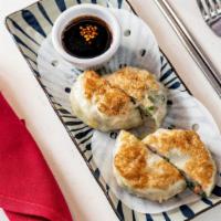 Chive Shrimp & Pork Dumplings · An Asian kitchen exclusive! Juicy, meaty dumpling medallions steamed and lightly pan-fried, ...