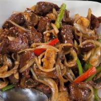 Black Pepper Steak · Tender filet mignon sautéed with bell peppers, mushrooms, and white onions in our black pepp...