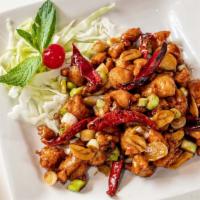 Spicy Chicken · Spicy. Diced chicken sautéed with dry chili peppers, szechuan peppercorns, and garlic.