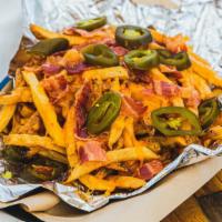 Snookies Infamous Cheese Fries · The original cheese fries of dallas served at our family restaurant for 28 years. A whole po...
