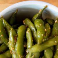 Garlic Edamame · Sauteed soy beans tossed in a slightly sweet garlic soy sauce.