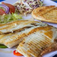 Tilapia  A La Plancha · grilled with a bed of grilled onions and peppers