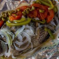 Mojarra Empapelada · baked in foil with onions, olives, bell peppers and butter