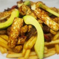 Parrilla Mixta · Chicken, steak, Italian sausage, peppers, onions, fried cheese, avocados, French fries and g...