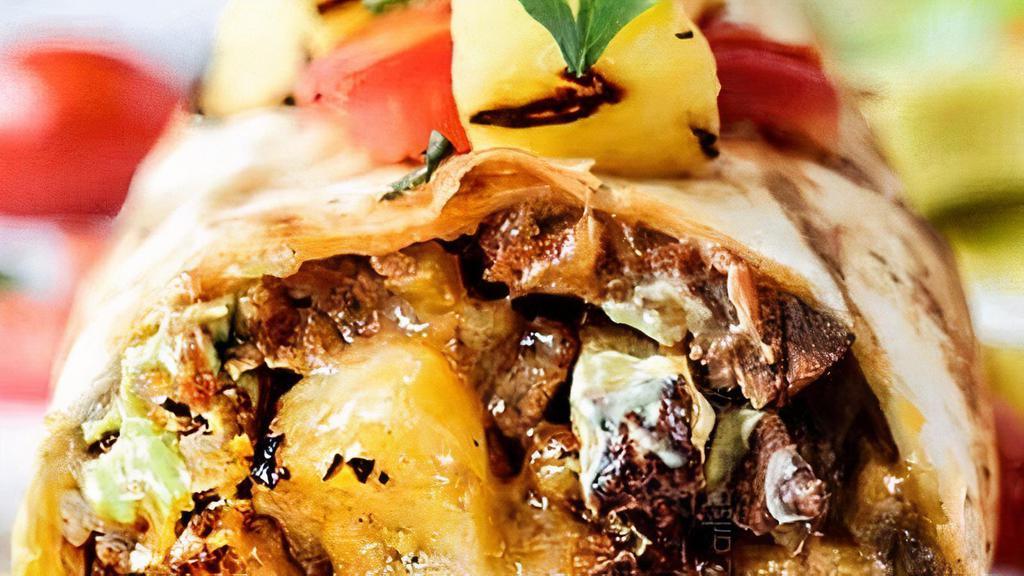 Al Pastor Burrito · Lettuce, rice, beans, cheese, sour cream, Pineapple and pico de gallo. Meat is (Pork)