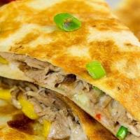 Carnitas Quesadilla · Cheese, onions, red peppers, green peppers. Meat is pork. Side of sour cream and pico de gal...