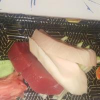 Sashimi Bento Bento · Four assorted pcs of sashimi.