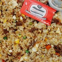 Beef Fried Rice · Contains peas, carrots, onion and corn