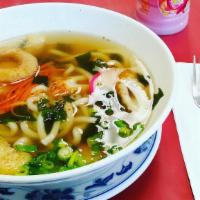 Udon Soup · Contains thick udon noodle, seaweed, shrimp tempura, deep fried tofu and fish cake
