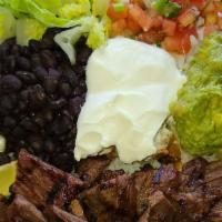 Steak Burrito Bowl · Rice, black beans, pico de gallo, sour cream, cheese and guacamole.